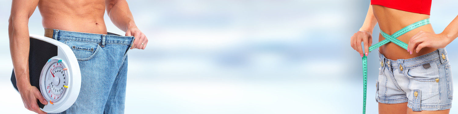 Slimming man abdomen with big pants over blue background.